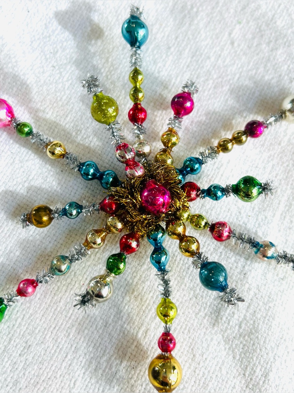 Vintage repurposed holiday star burst Christmas Ornament